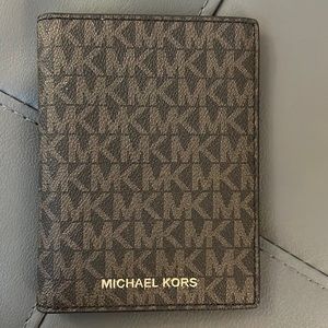 Like new Michael Kors passport wallet.